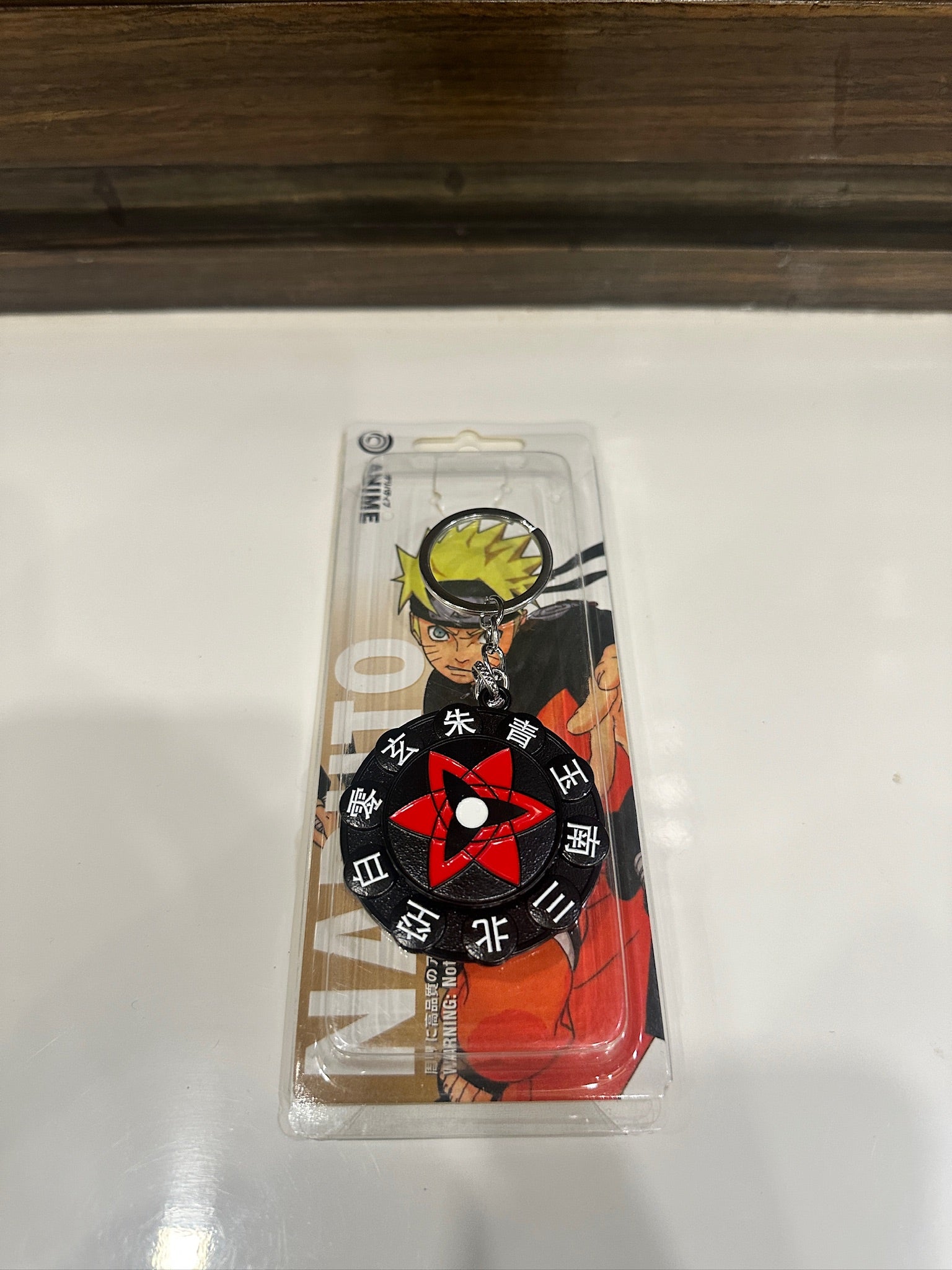 Sasuke Mangekyou Sharingan Spinner Keychain