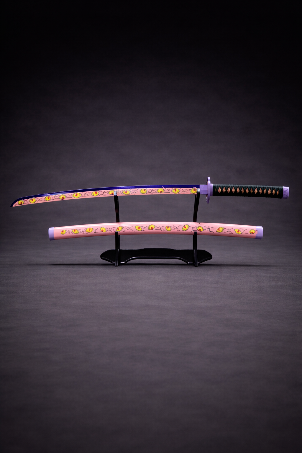 Sword and sheath on a stand with eyes like design against a dark background