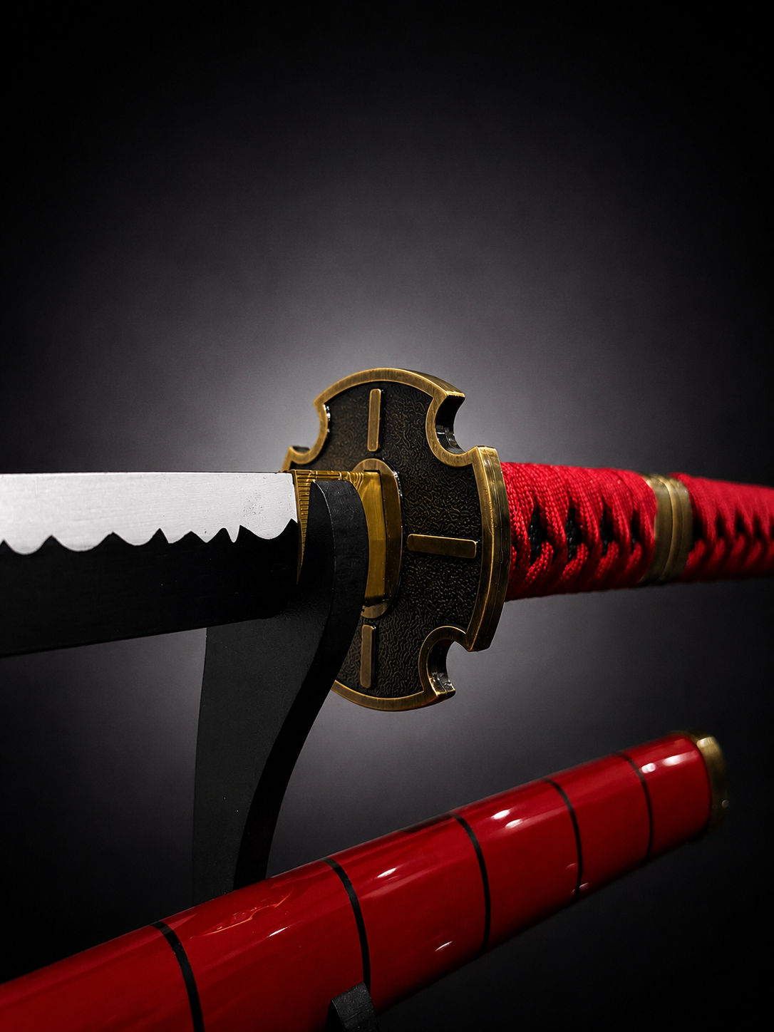 Close-up of red anime katana handle and golden tsuba guard featuring detailed serrated Nichirin-style blade craftsmanship