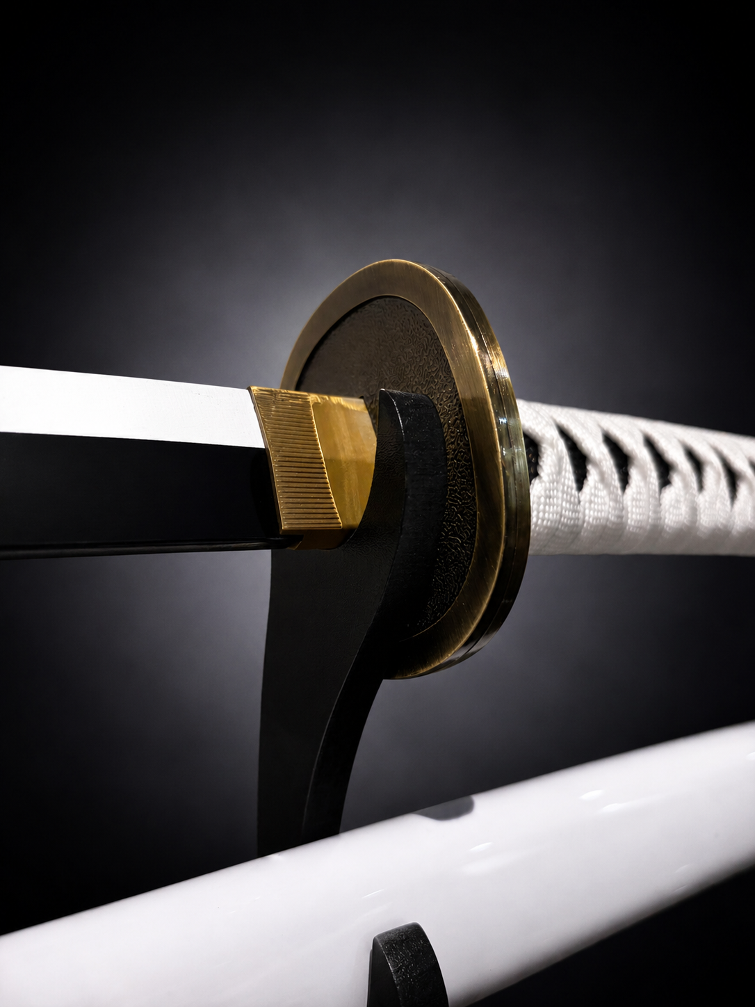 Close-up of white katana handle and gold circular tsuba guard featuring black anime-style blade and detailed craftsmanship display