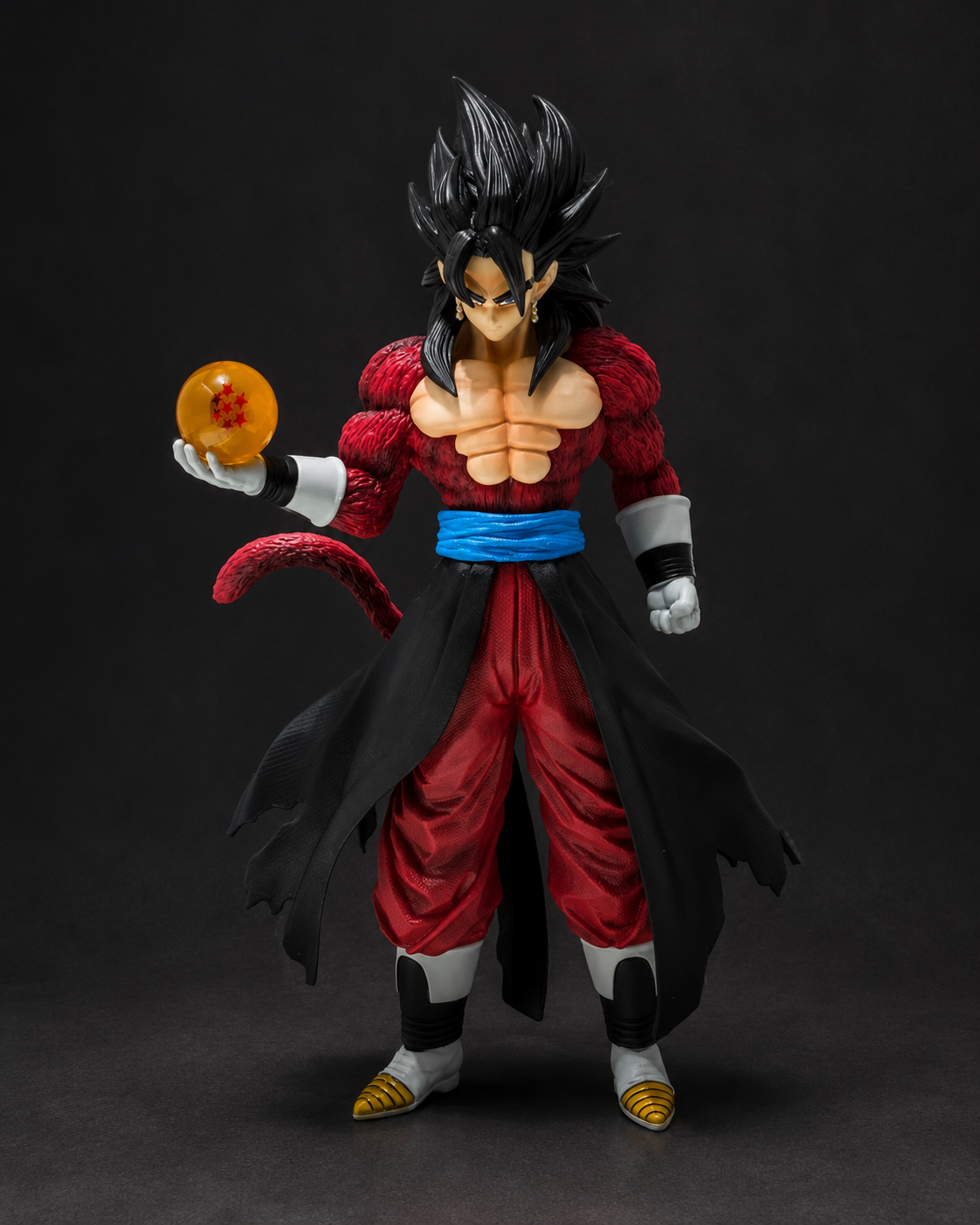 Super Saiyan Gohan action figure from Dragon Ball Z, holding a golden Dragon Ball, set against a dark studio background.