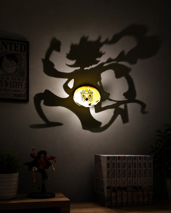 One Piece Gear 5 Luffy Shadow Projection Night Lamp projecting an iconic Gear 5 silhouette with warm LED lighting for anime room décor, gaming setups, and collector displays.