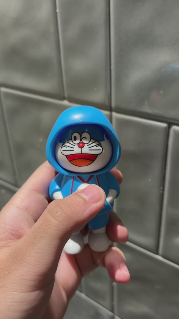 Doraemon Multi-Face Turning Keychain | Rotating Anime Keychain for Bags & Keys
