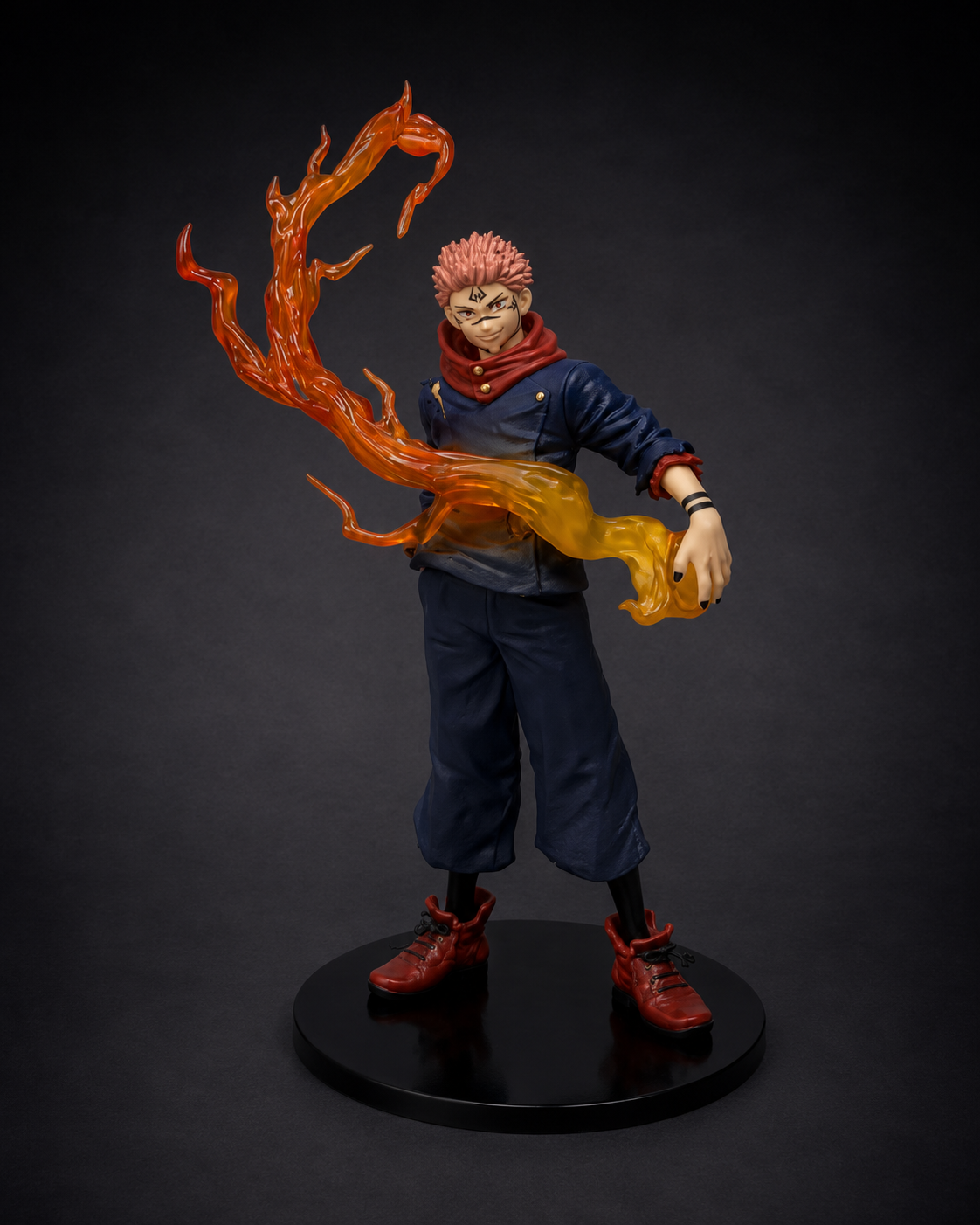 Ryomen Sukuna Jujutsu Kaisen anime figure with flame effect collectible statue on premium dark studio background
